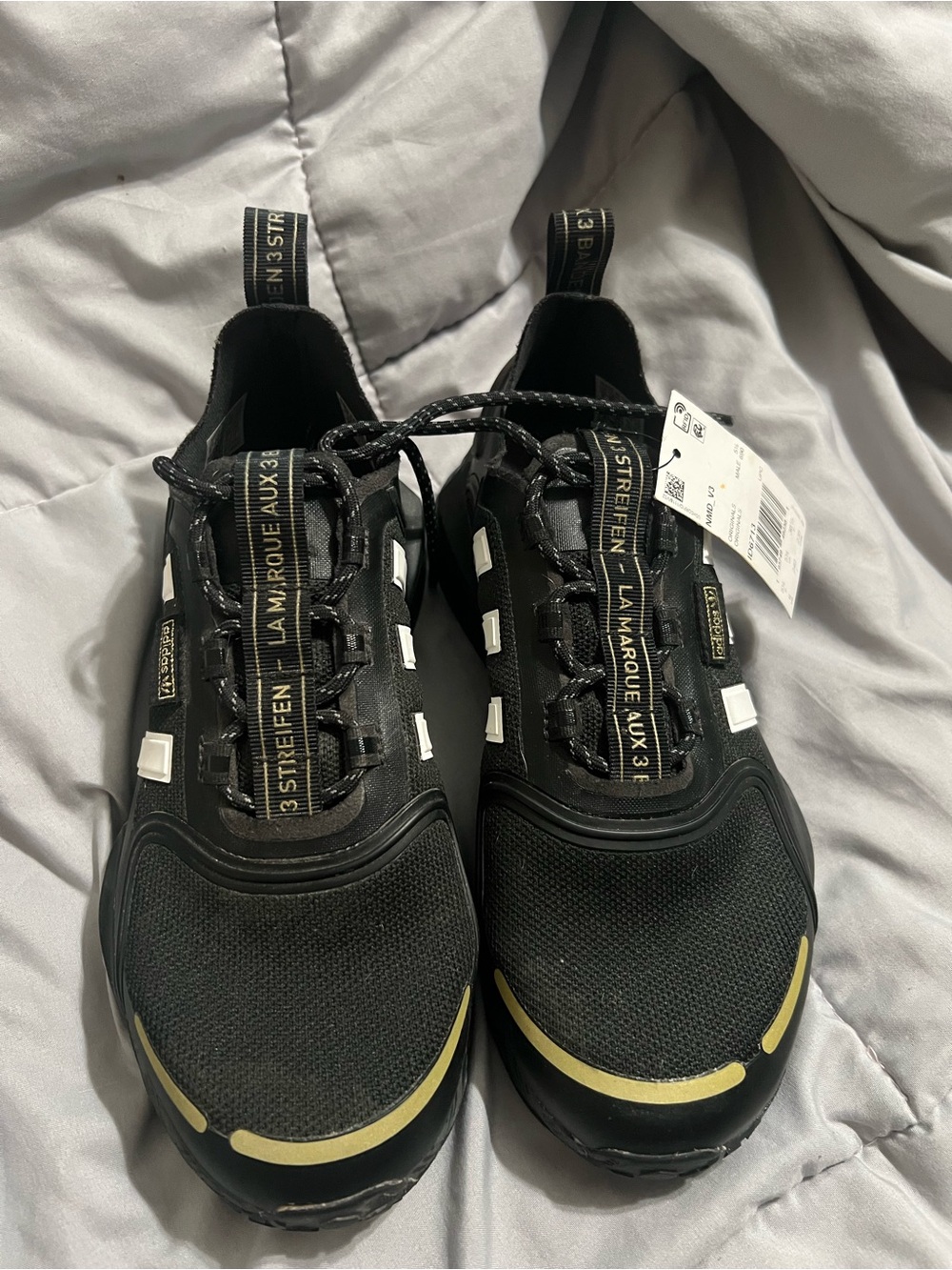 adidas Black Athletic Sneakers with Gold Accents